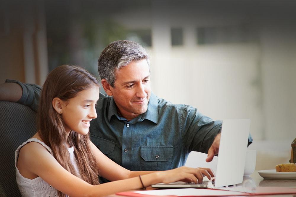 Father Learning Coach and daugther are taking an Arizona Connections Academy class online. 