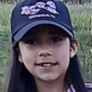 Image of Abigail, a student at Minnesota Connections Academy in a blue and purple ball cap.